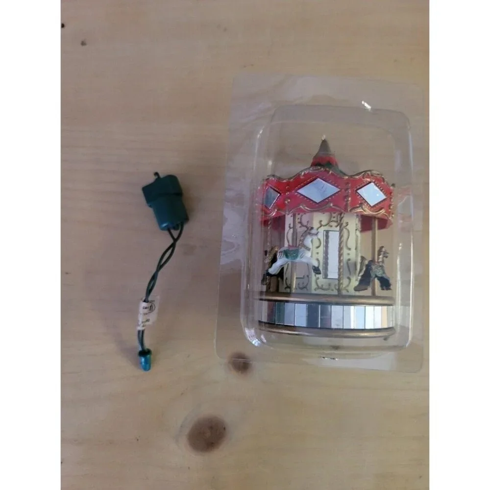 Vintage Noma OrnaMotion Rotating Christmas Ornament‎ Merry-go-round 1989